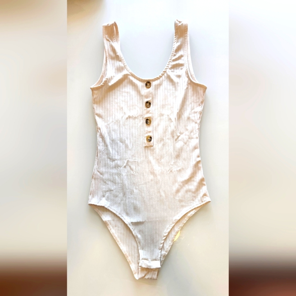 White Bodysuit with decorative buttons